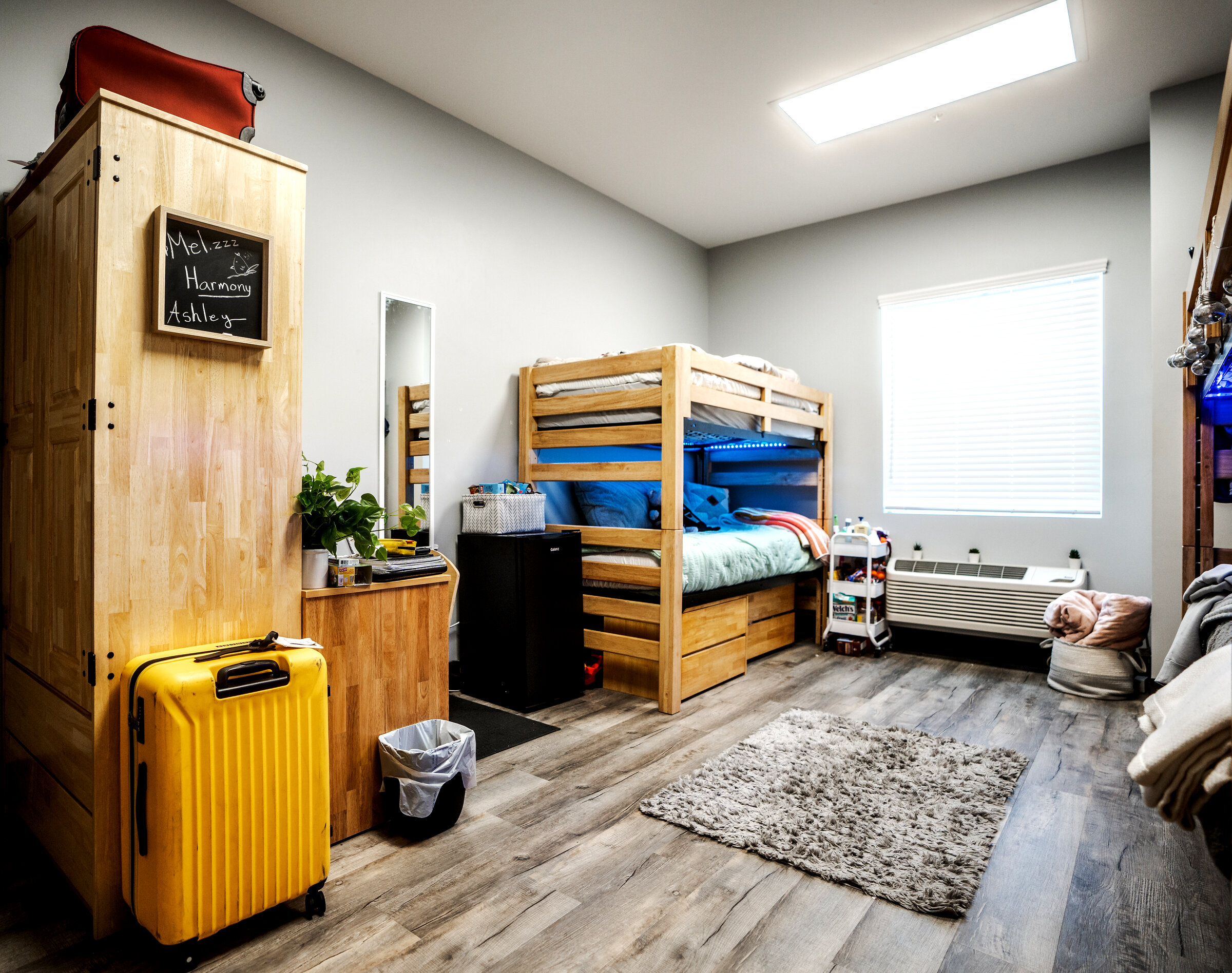 Modern residential facility with organized living space and LED lighting