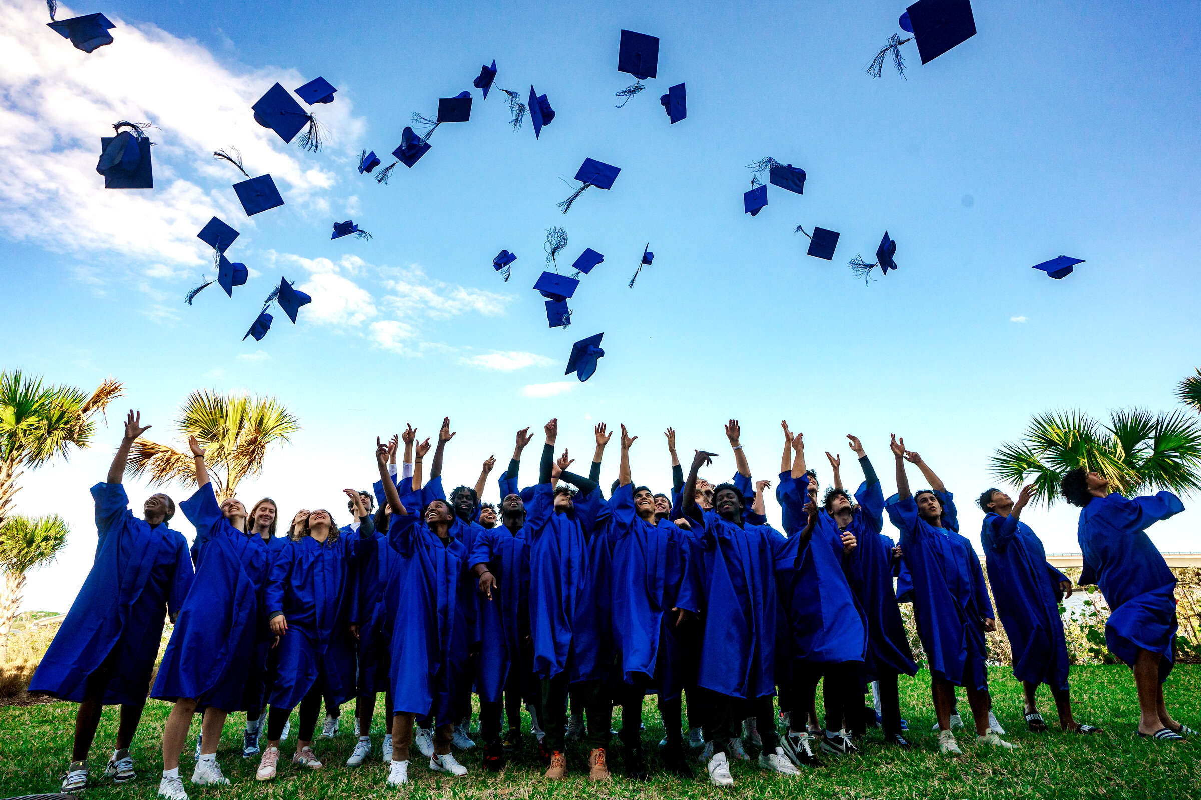 DME Academy graduation ceremony with cap toss